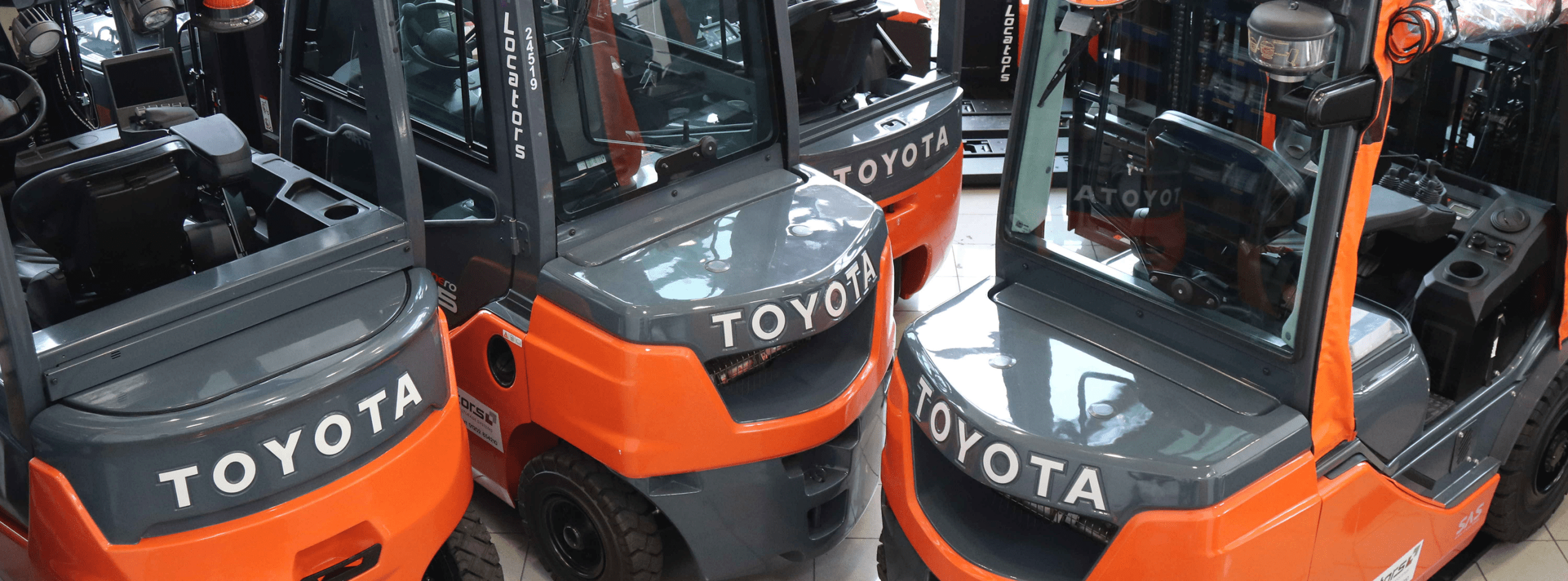 A lineup of new Toyota forklifts, representing a significant forklift dorset purchase for any business.